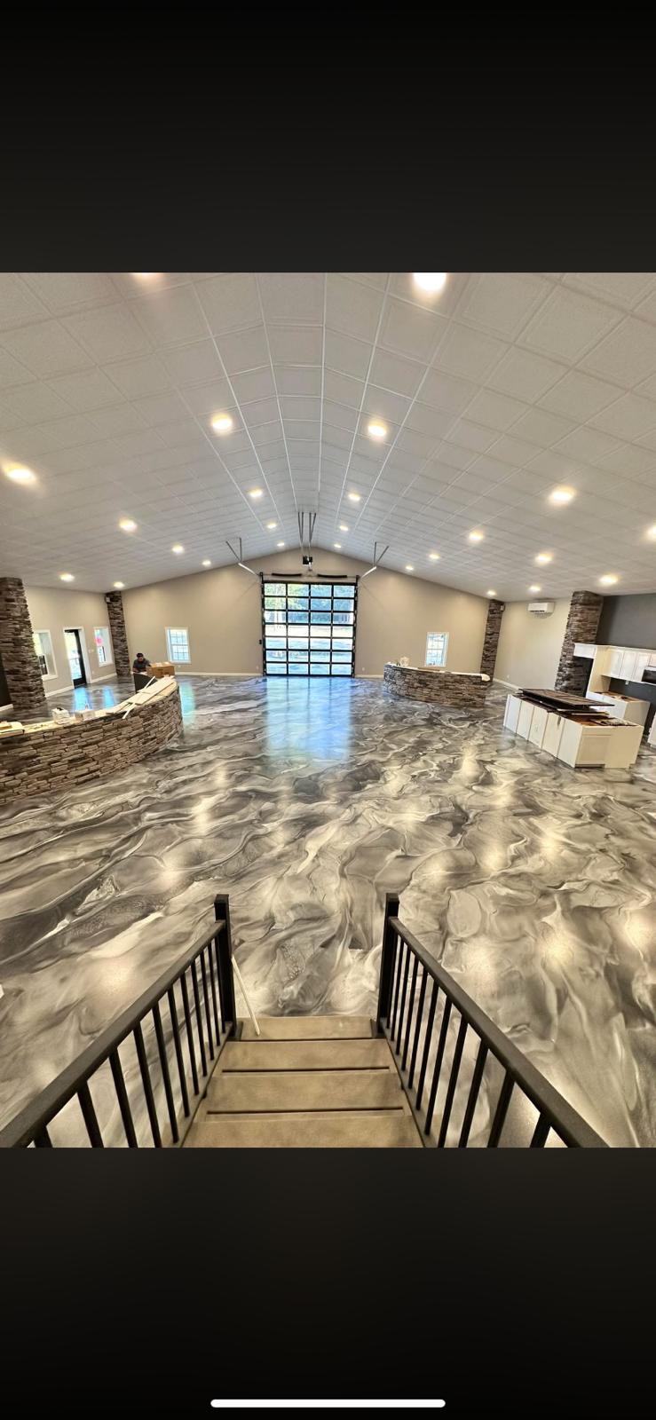 Silver metallic resin showroom floor by Epoxy Guys